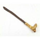 ANTIQUE OR VINTAGE HEAD HUNTERS SWORD FROM BORNEO DETAILED CARVING BONE HANDLE, STILL WITH TUFT OF