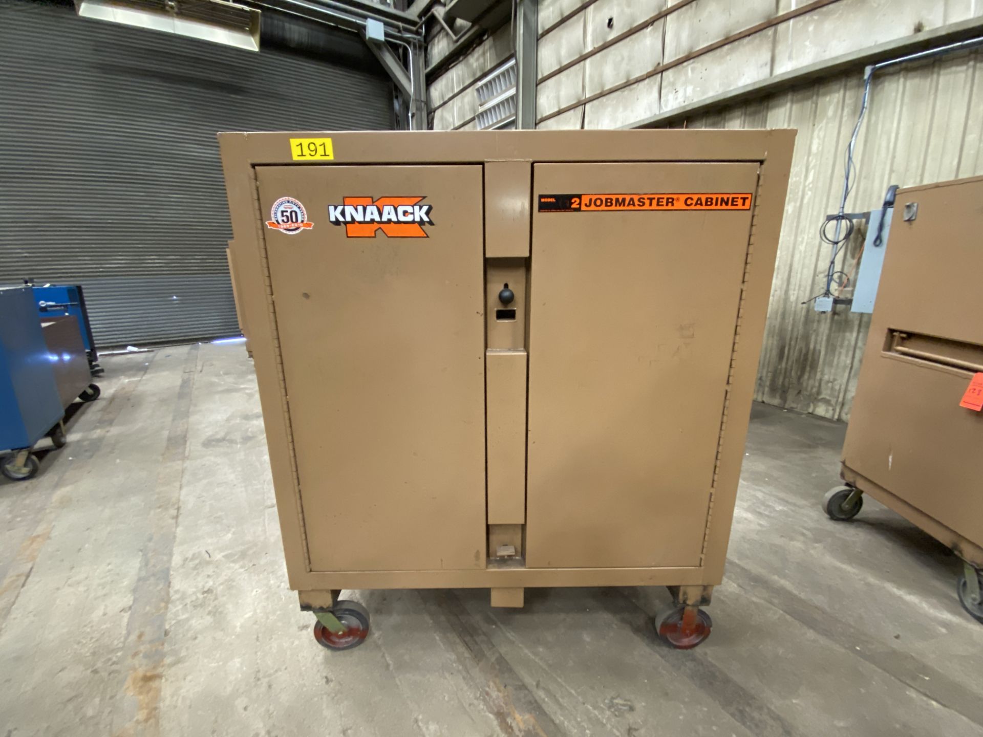 Knaack Jobmaster mn 112 rolling job site tool cabinet, 2 door, 52" x 27", 52" inside measurements,