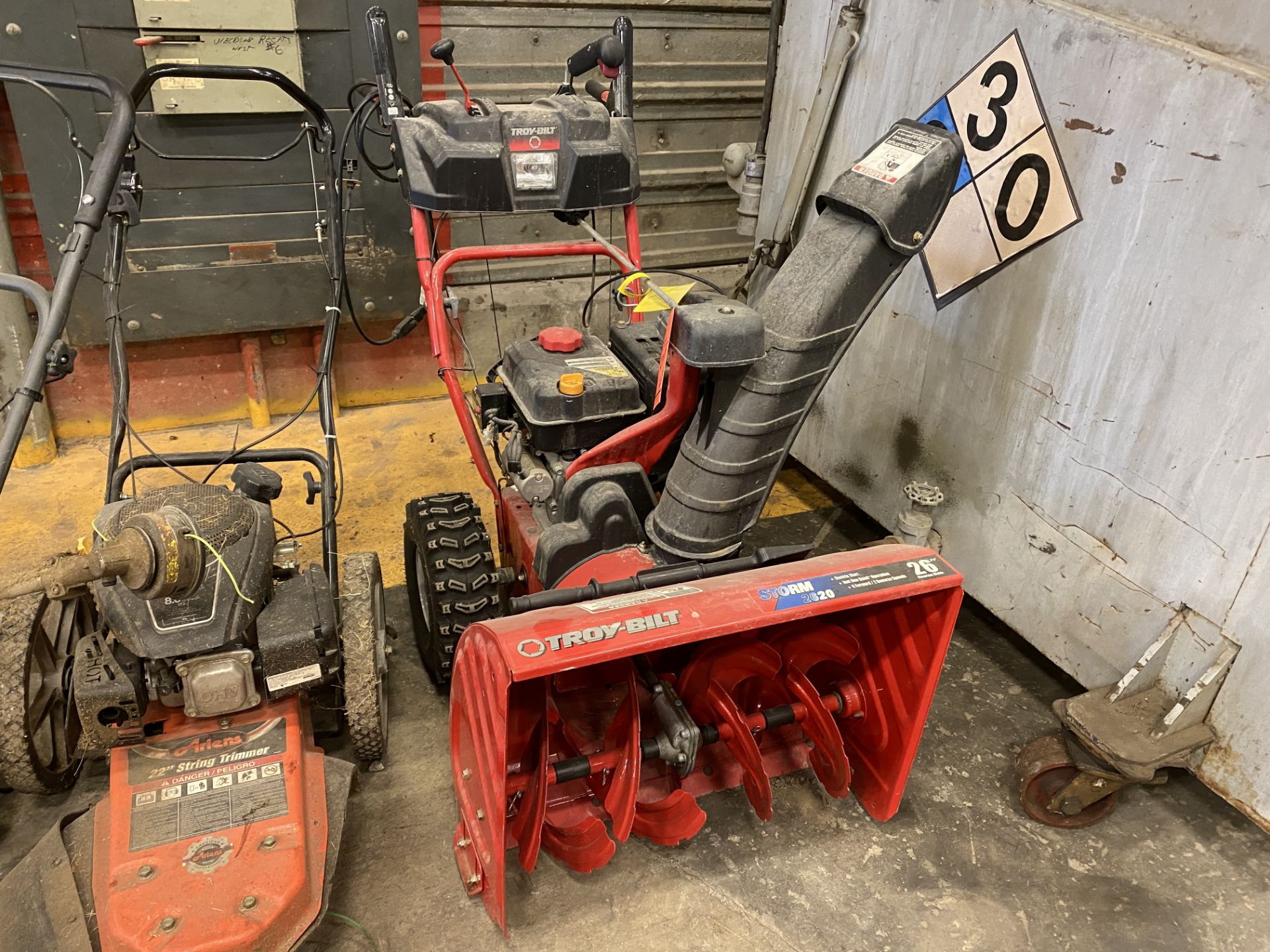 Lot of landscaping equipment, including Troy bilt 26" gas snowblower, a Ariens gas drive 22" rolling