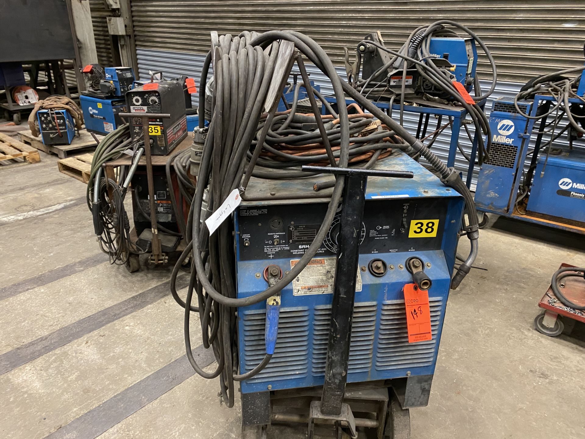 Miller SRH-333 CC DC arc welder SN KB988454 on rolling cart