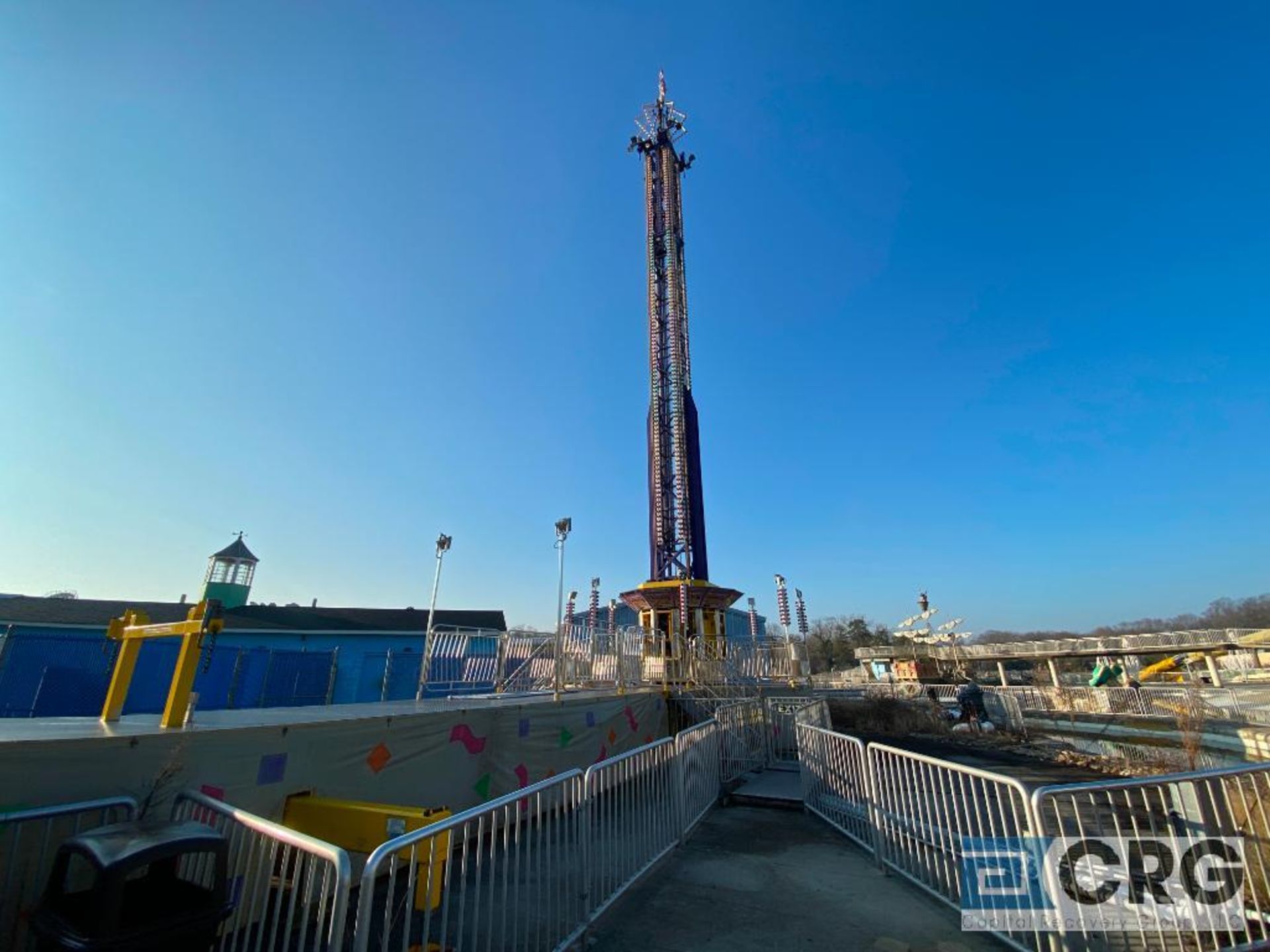 Thunder Drop T/A trailer mounted drop tower with elevated steel fold away entrance and exit platform