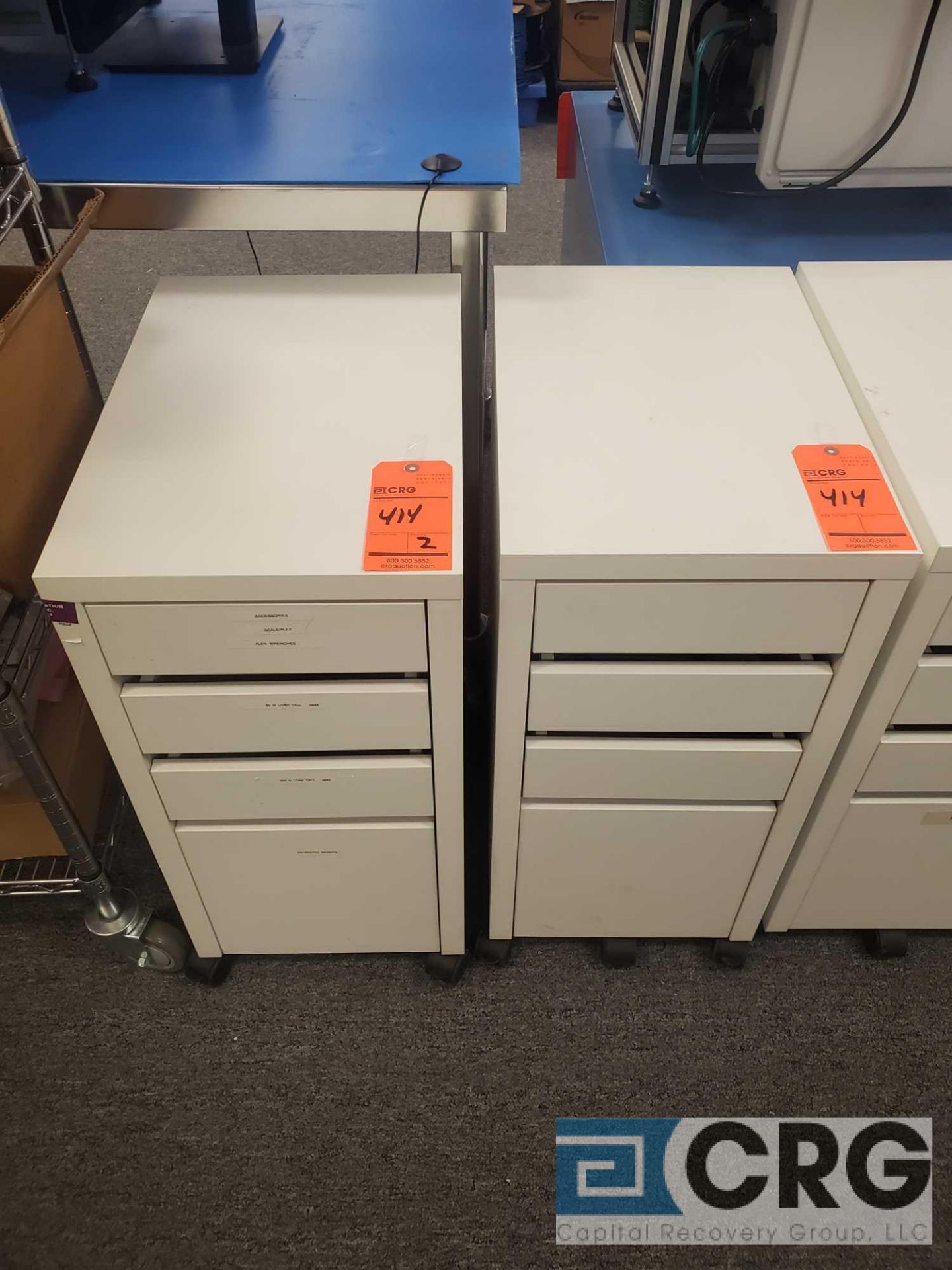 Lot of (2) 4-drawer portable formica undercounter cabinets