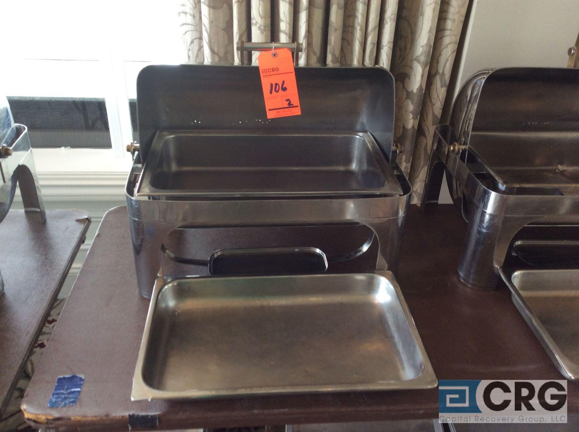 Lot of (2) commercial steel grade roll top chafing dishes, 27 X 19 X 22 inch tall with food and