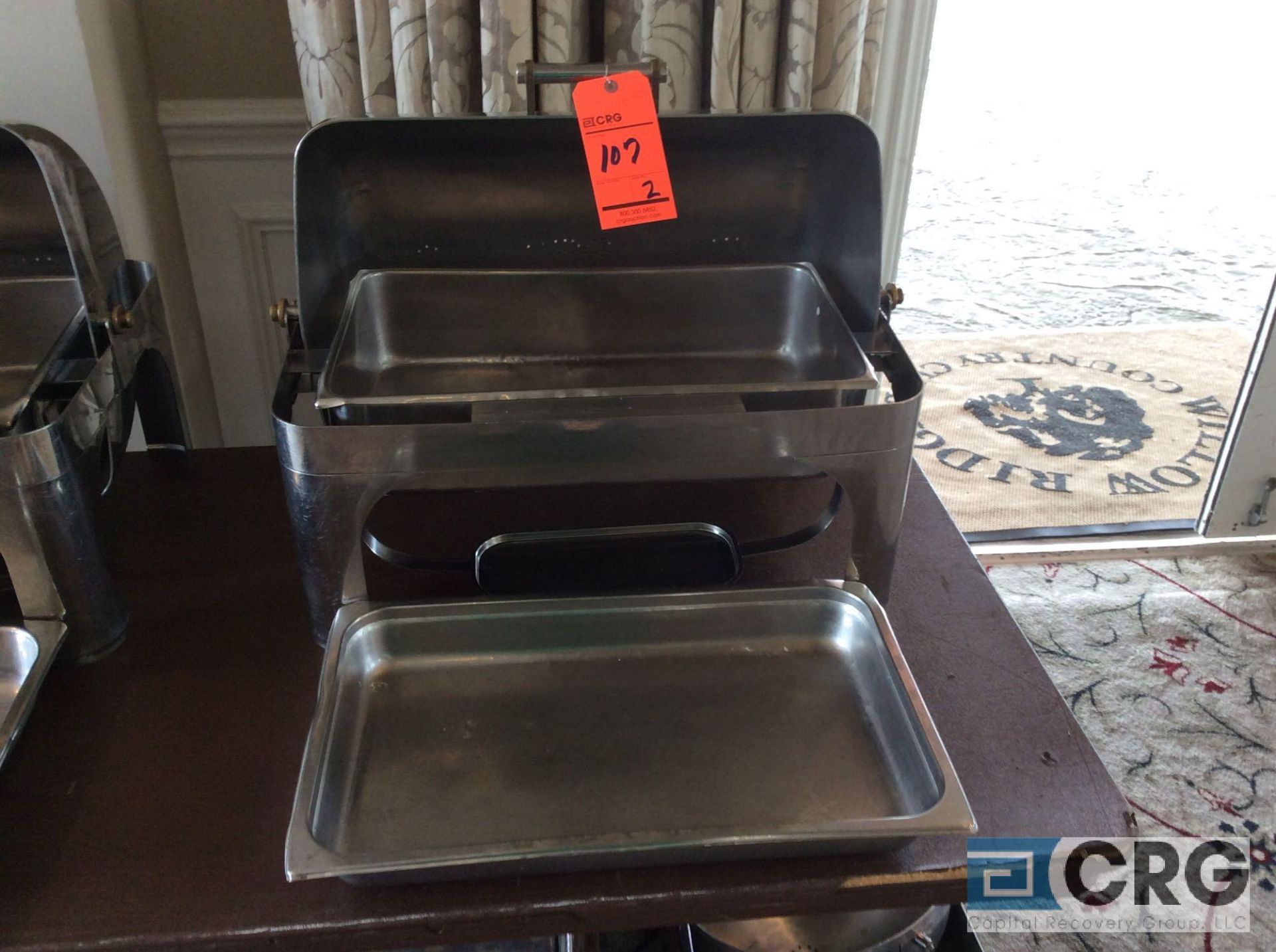 Lot of (2) commercial steel grade roll top chafing dishes, 27 X 19 X 22 inch tall with food and