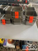 Lot of (21) 10.5 x 13 inch stainless steel steam table pans of varying depths, including (4) 6