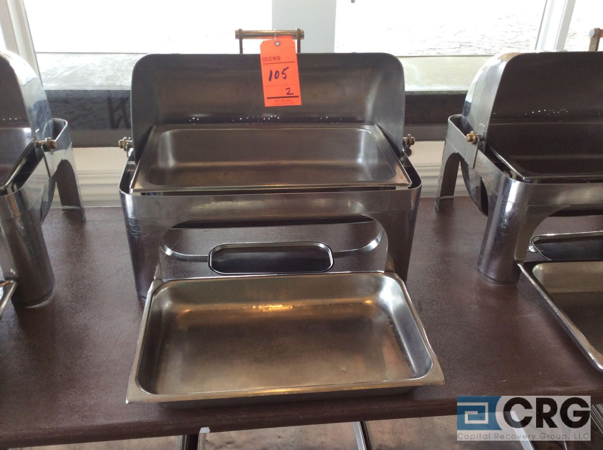 Lot of (2) commercial steel grade roll top chafing dishes, 27 X 19 X 22 inch tall with food and