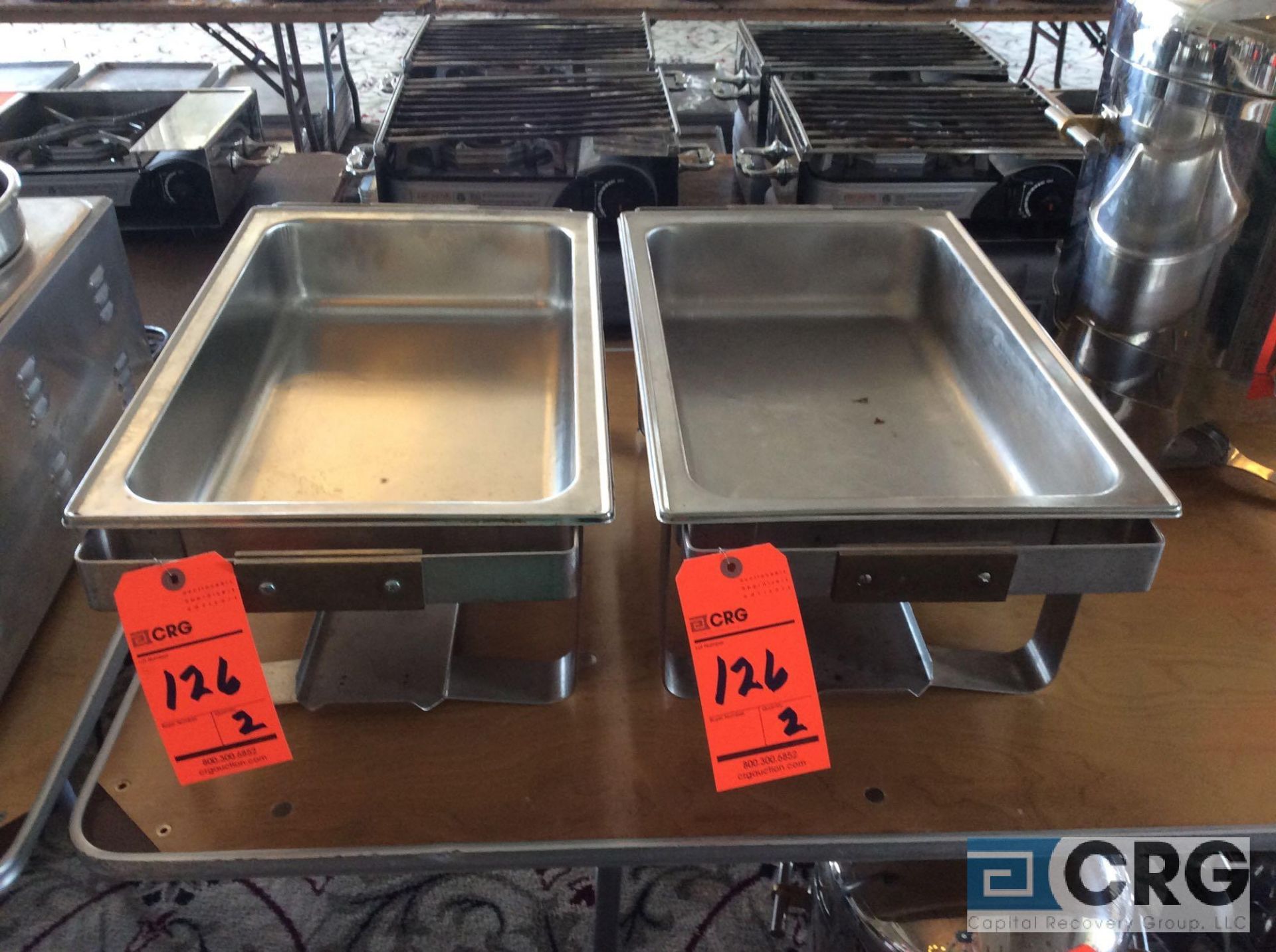Lot of (2) matching chafing dishes with brass accents and insert pan