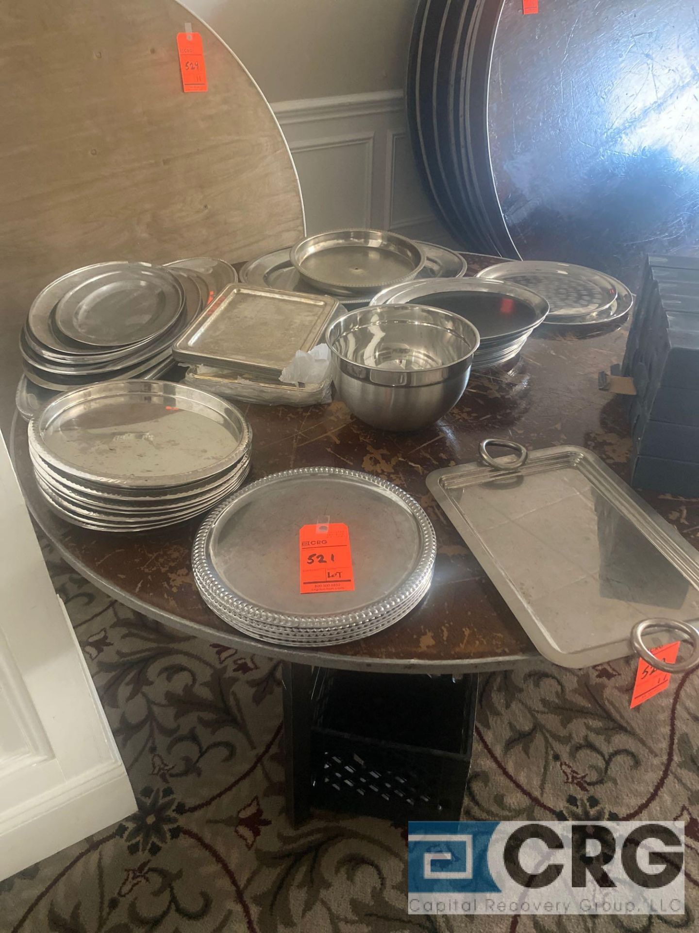 Lot of assorted metal and plastic serving trays platters, including (6) trays with a gadroon edge-