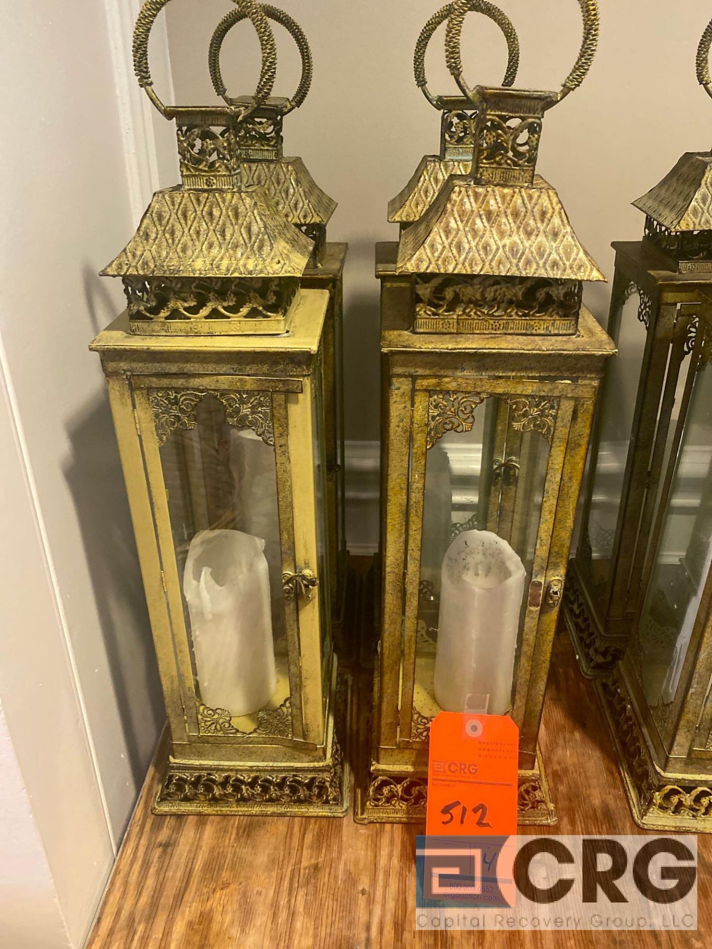 Lot of (6) decorative candle lanterns 7 inch X 7 base 26 inches tall, including (2) that are damaged