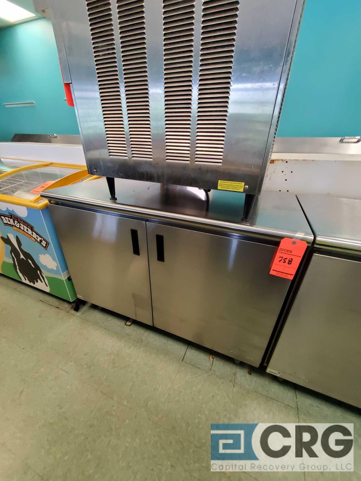 Stainless steel table with 2 shelf compartment, 4 ft (w) x 24 in. (deep) x 36 in. (tall)