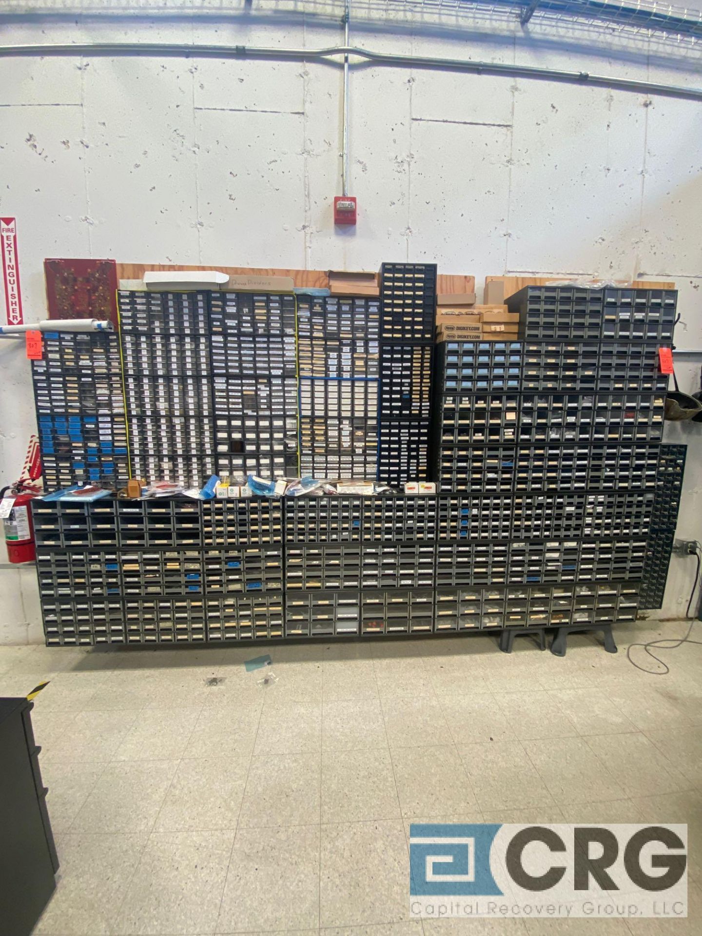 Lot of parts cabinets, including assortment of computer and electrical parts, screws, nuts bolts,