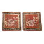 Arte Himalayana A pair of seat carpets decorated with peonies over red ground Tibet, 19th century .