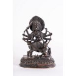 Arte Himalayana A bronze figure of Durga slaying the demon (Mahisasuramardini)Nepal, 19th century .