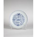 Arte Cinese A blue and white porcelain dish painted with auspicious symbols and bearing a mark at t