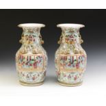 Arte Cinese A pair of Canton porcelain vases painted with characters within reserves China, 19th ce