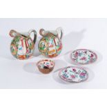 Arte Cinese A pair of Canton porcelain jugs, a cup and two Indian company saucer dishes China, Qing