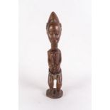 Arte africana A blolo bian figure, BauleIvory Coast.