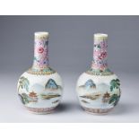 Arte Cinese A pair of famille rose porcelain tianchuping vases painted with landscape and bearing a
