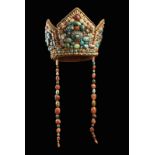 Arte Himalayana A crown shaped headgear with coral and turquoise beadsLadakh, 19th century .