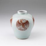 Arte Cinese A porcelain vase painted with red phoenixes and bearing a seal mark at the base China,
