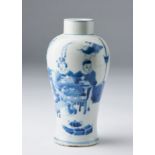 Arte Cinese A blue and white porcelain vase painted with children at leisure and bearing a four cha