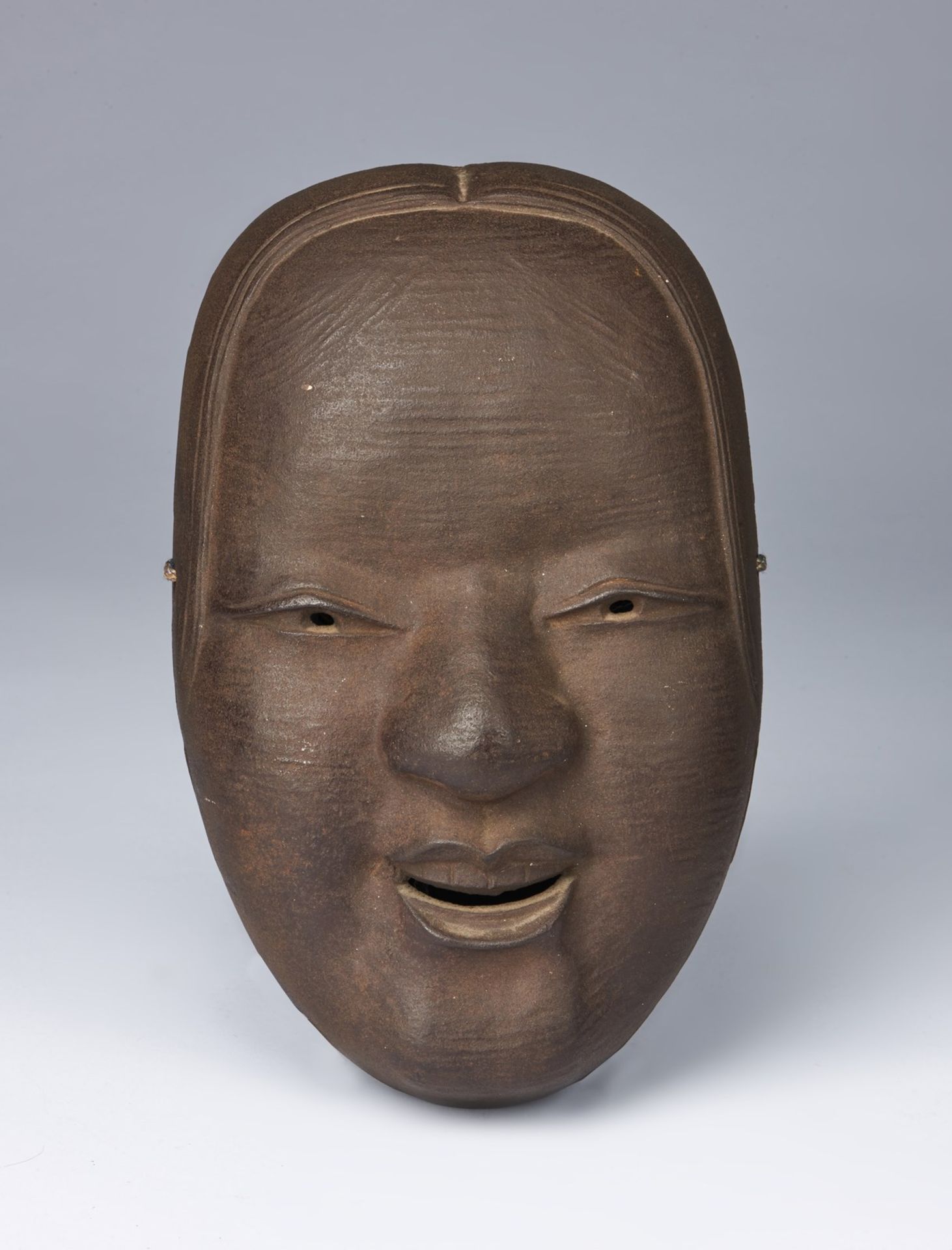 ARTE GIAPPONESE An iron mask depicting a lady Japan, Taisho period, early 20th century .