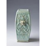 Arte Cinese A moulded celadon glazed vase bearing a Qianlong seal mark at the baseChina, Qing dynas
