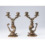 Wunderkammer A pair of cast bronze candlesticks shaped as a dolphine over a turtleItaly, 19th centu