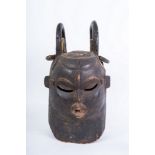 Arte africana Two-faced helmet mask, IgboNigeria.