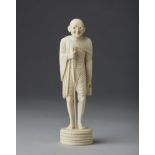 Arte Indiana An ivory standing figure of marching Mahatma Gandhi Anglo India, 1930 ca. .