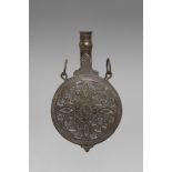 Arte Islamica A brass engraved powder flask North Africa or Turkey, 19th century .