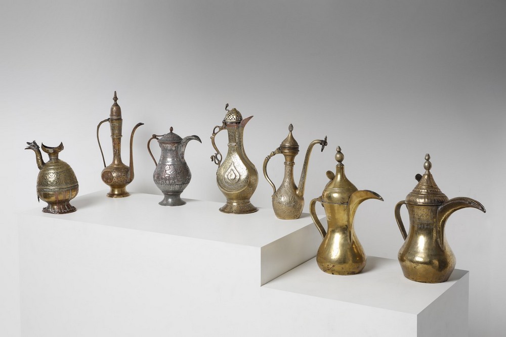 Arte Islamica A collection of seven metal engraved large coffee pots Central Asia, Iran and Kashmir