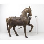 Arte Indiana A highly decorative large wooden horse coated with embossed and engraved copper sheetN