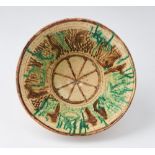 Arte Islamica An earthenware splash glazed bowlAfghanistan, 20th century .