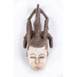 Arte africana Agbogho mmwo helmet mask, IgboNigeria.