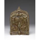 Arte Indiana An embossed brass plaque depicting Lord Vishnu's Lotus Feet and bearing a long devanag