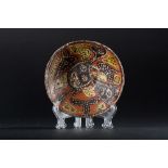 Arte Islamica An earthenware slip painted dish decorated with a birdEastern Iran, 10th - 11th centu