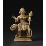 Arte Indiana A bronze figure of Durga over the lion India, Orissa, 19th -20th century .