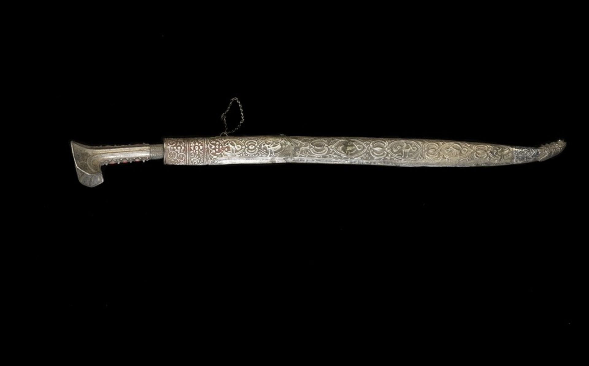 Arte Islamica An Ottoman silver and coral Yataghan with gilded inscribed and decorated blade Balcan