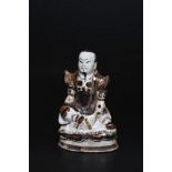 Arte Cinese A porcelain statue depicting GuandìChina, Yuan/Ming dynasty, 14th - 16th century .