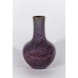 Arte Cinese A pottery flambé glazed lavander and red bottle vase China, late 19th century.