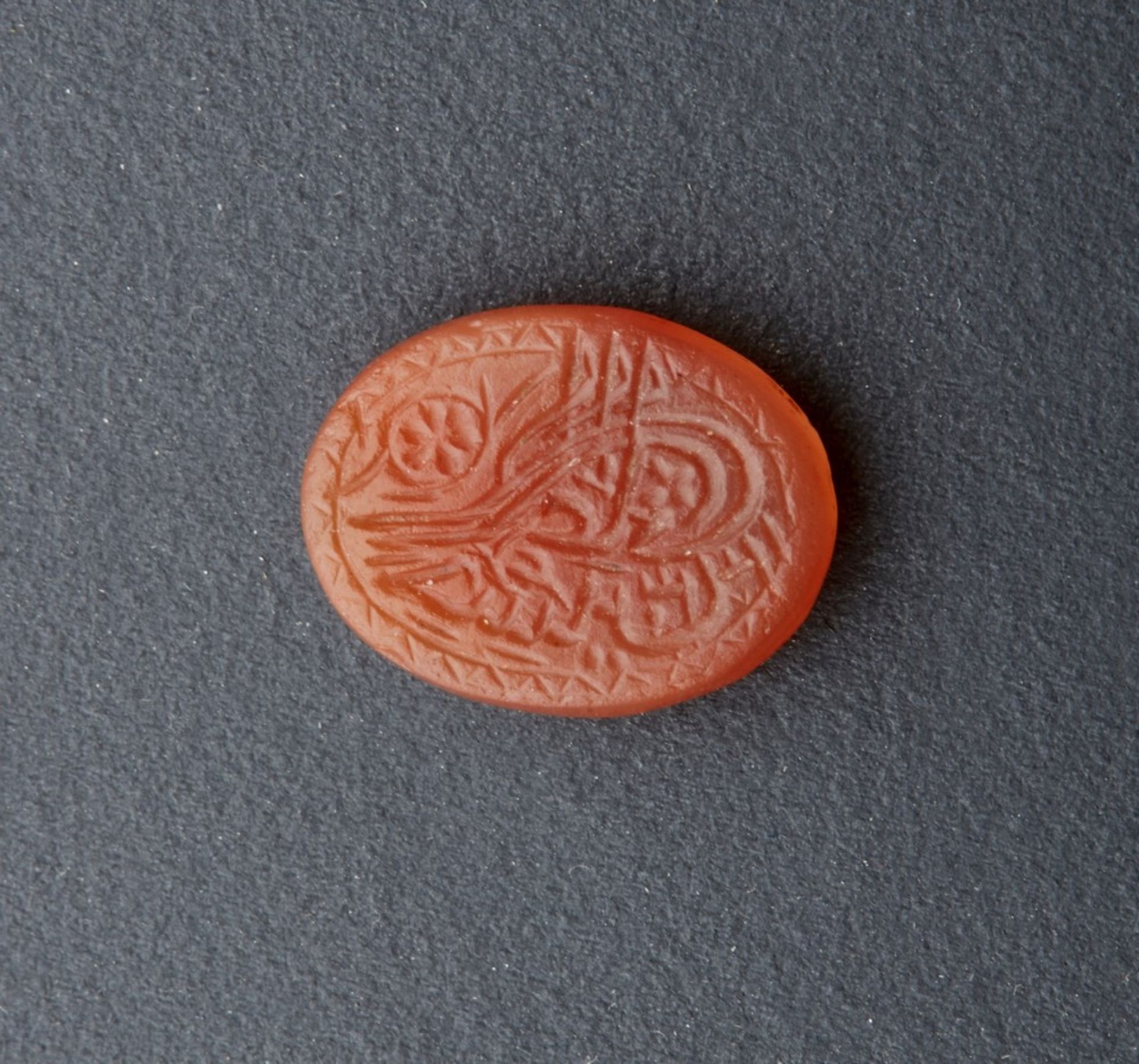 Arte Islamica  A small carnelian seal carved with tughra Ottoman Turkey, dated 1912.