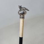 A walking stick, with silver coloured metal top in the form of a fox, on ebonised shaft, 92 cm