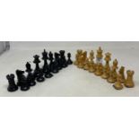 A stained and natural wood chess set, loaded, the king 9 cm high, boxed