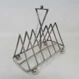 A Victorian silver toast rack, in the manner of Dr Christopher Dresser, Birmingham 1887, 2.7 ozt, 11