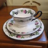 A Shelley tea service, decorated roses, comprising a cream jug, sugar bowl, pair of plates, 12 cups,