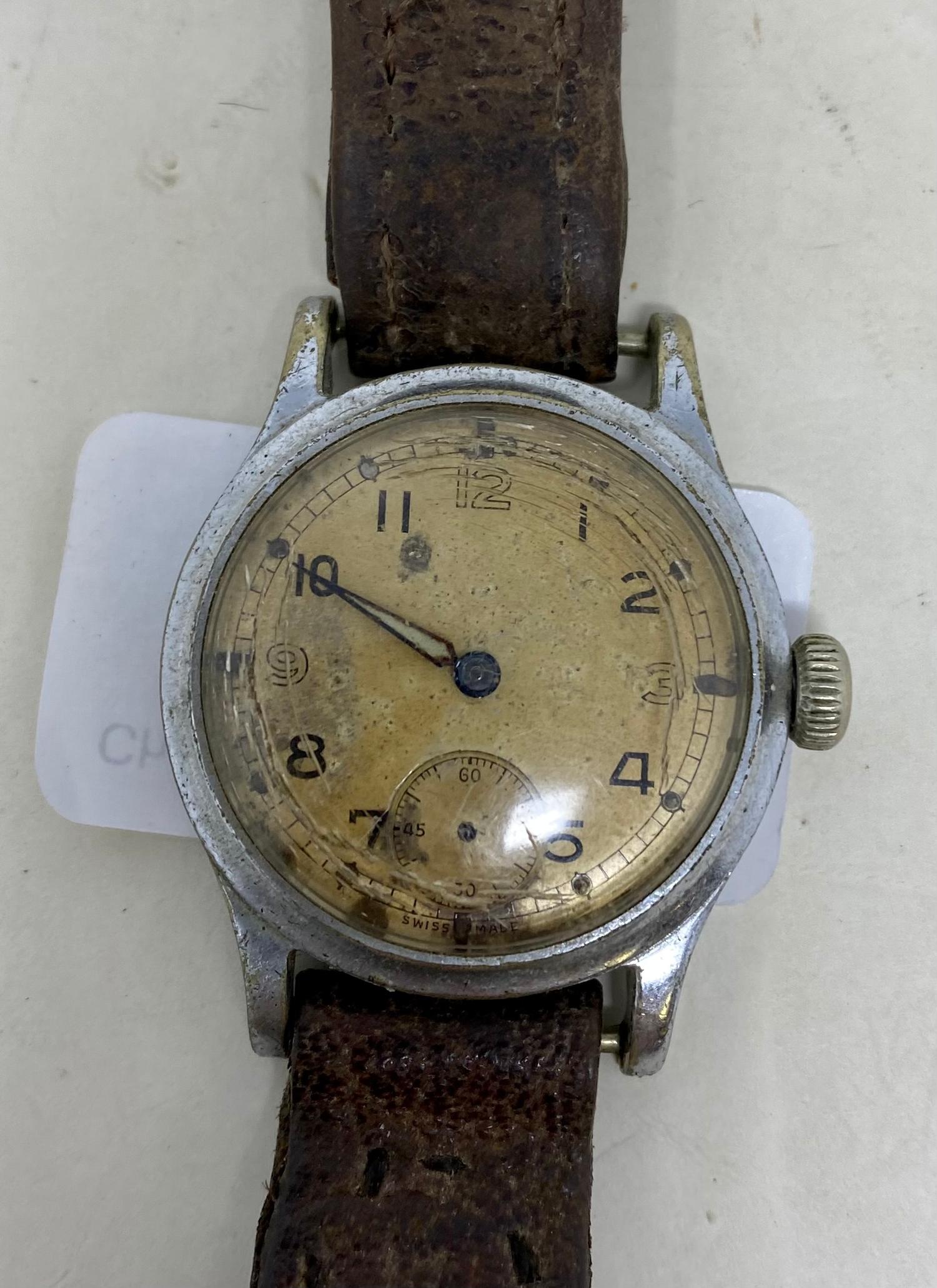 An MOD issue stainless steel wristwatch, the back marked with a crow's foot ATP Q6131, lacks seconds