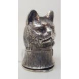 A modern silver coloured metal novelty vesta, in the form of a cat, 4 cm high