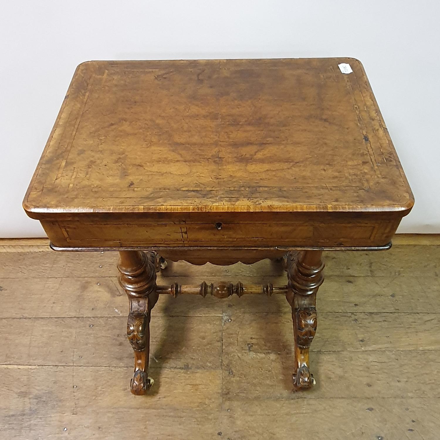 A 19th century walnut workbox, on a column supports and splay legs united by stretcher, 54 cm wide - Image 2 of 5