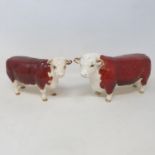 A Beswick Hereford bull, and a Hereford cow, 1360 (2)